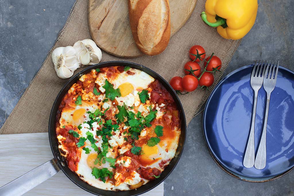 Shakshuka poached eggs in tomato sauce recipe
